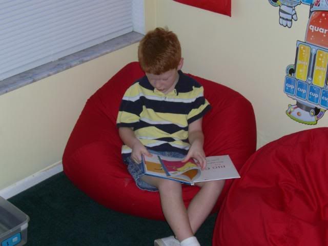 tyreads Ty reading a book.