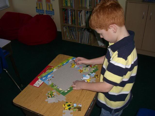 typuzzle Ty works on a puzzle.