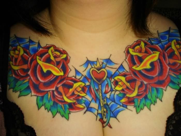 rose tattoo on top breast for sexy women