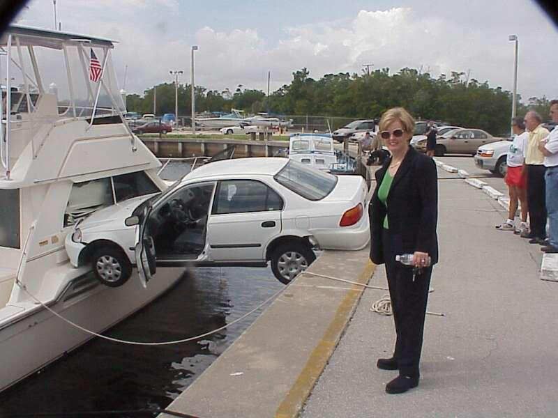 vehicle-hits-docked-boat-woman-d-1.jpg